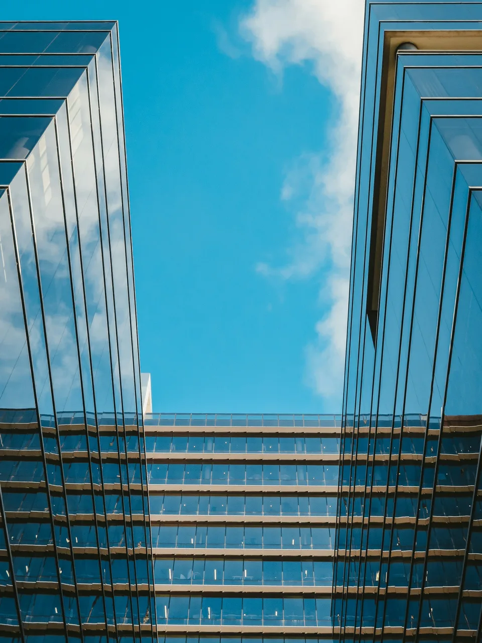Reflective glass architecture and open sky in Melbourne